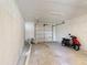Spacious garage with concrete floors at 857 E Flag Ln, Kissimmee, FL 34759