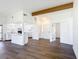 Open concept living area with modern flooring and updated kitchen at 857 E Flag Ln, Kissimmee, FL 34759