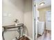 Hallway leading to laundry area with view of the washer and dryer at 898 Hendry Dr, Orlando, FL 32822