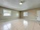Spacious living room featuring tile floors and natural light at 898 Hendry Dr, Orlando, FL 32822