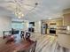 Open-concept living space seamlessly connects kitchen, dining, and living areas at 898 Hendry Dr, Orlando, FL 32822