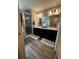 Bathroom featuring double sink vanity and glass shower at 9028 Se 41St Court Rd, Ocala, FL 34480