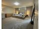 Spacious bedroom with carpeting and large windows at 9028 Se 41St Court Rd, Ocala, FL 34480