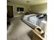 Spacious bedroom features a large TV and neutral decor at 9028 Se 41St Court Rd, Ocala, FL 34480