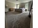 Bright bedroom with neutral colors and a large bed at 9028 Se 41St Court Rd, Ocala, FL 34480