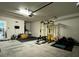 Spacious garage featuring a full home gym at 9028 Se 41St Court Rd, Ocala, FL 34480