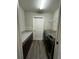 Well-equipped laundry room with modern washer and dryer units at 9028 Se 41St Court Rd, Ocala, FL 34480