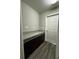 Mud room with built-in storage cabinets and countertop at 9028 Se 41St Court Rd, Ocala, FL 34480