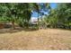 Spacious backyard with mature trees that provide privacy and shade at 1003 Chesterfield Cir, Winter Springs, FL 32708
