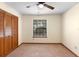 Bedroom with neutral carpet, ceiling fan, and closet space at 1003 Chesterfield Cir, Winter Springs, FL 32708