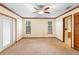 Bedroom with neutral carpet, ceiling fan, and natural light at 1003 Chesterfield Cir, Winter Springs, FL 32708