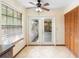 Bright breakfast nook with french doors leading to a screened porch and adjacent to the kitchen at 1003 Chesterfield Cir, Winter Springs, FL 32708