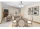 Inviting dining area with fireplace view, seamlessly connected to the living area, featuring a round table at 1003 Chesterfield Cir, Winter Springs, FL 32708