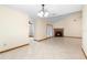 Open dining room area with space to accommodate a large table and chairs, adjacent to the living area at 1003 Chesterfield Cir, Winter Springs, FL 32708