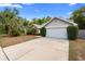 Charming single-Gathering home with a two-car garage and well-maintained landscaping at 1003 Chesterfield Cir, Winter Springs, FL 32708