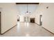 Bright living room featuring a cozy fireplace, tile floors, and access to the outdoors at 1003 Chesterfield Cir, Winter Springs, FL 32708
