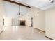 Large living room with vaulted ceiling, fireplace, french doors and tile flooring at 1003 Chesterfield Cir, Winter Springs, FL 32708