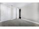 Neutral bedroom with two double-door closets and wall-to-wall carpeting at 10196 Bucklow Hill Dr, Orlando, FL 32832