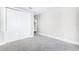 Neutral bedroom with a double-door closet and plush carpeting at 10196 Bucklow Hill Dr, Orlando, FL 32832