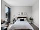 Bedroom with carpet floors, natural light, and a minimalistic contemporary design at 10196 Bucklow Hill Dr, Orlando, FL 32832