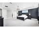 Beautiful main bedroom with accent wall, tray ceiling, and closet access at 10196 Bucklow Hill Dr, Orlando, FL 32832