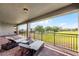 Large covered patio offers scenic views of the golf course, lake, and community at 10196 Bucklow Hill Dr, Orlando, FL 32832