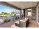 Charming covered patio with brick floors provides a relaxing space to unwind and enjoy the surroundings at 10196 Bucklow Hill Dr, Orlando, FL 32832