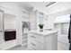 Bright and organized walk-in closet with custom shelving and an island at 10196 Bucklow Hill Dr, Orlando, FL 32832