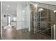 Temperature controlled wine cellar with glass door adjacent to the kitchen at 10196 Bucklow Hill Dr, Orlando, FL 32832