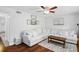 Comfortable living room with wood floors, light colored sectional, and decorative wall art at 1020 Grove St # 29, Maitland, FL 32751