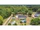 Aerial view of the property featuring a home with beautiful backyard and surrounding landscape at 10528 Old Dade City Rd, Lakeland, FL 33810