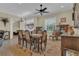 Bright dining room with elegant table setting and seamless living area access at 10528 Old Dade City Rd, Lakeland, FL 33810
