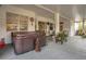 This covered patio includes a hot tub and seating area at 10528 Old Dade City Rd, Lakeland, FL 33810