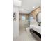 Modern bathroom featuring a floating vanity, updated fixtures, and a glass walk-in shower at 1113 Black Acre Trl, Winter Springs, FL 32708