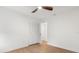Bedroom featuring a modern ceiling fan, hardwood floors, and a closet at 1113 Black Acre Trl, Winter Springs, FL 32708