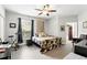 Inviting bedroom with large window, stylish decor, ceiling fan and ample space for relaxation and comfort at 114 Vista Verdi Cir # 136, Lake Mary, FL 32746