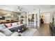 Bright living area with dining area, tile floors, comfortable seating and natural light at 114 Vista Verdi Cir # 136, Lake Mary, FL 32746