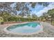 Inviting community pool with brick paver deck, poolside seating, and clear blue water for residents at 114 Vista Verdi Cir # 136, Lake Mary, FL 32746
