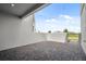 The townhome features a brick patio with ample sunlight and view at 14259 Kellogg Ave, Orlando, FL 32827