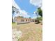 Large backyard with potential for landscaping and outdoor activities at 1603 Gaston Foster Rd, Orlando, FL 32812
