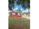 Charming single-story home with brick accents and a well-manicured front lawn at 1603 Gaston Foster Rd, Orlando, FL 32812