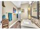 Bathroom features a single sink, mosaic tile accents, and stylish decor at 1610 River Birch Ave, Oviedo, FL 32765