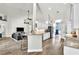 Open-concept living area flows seamlessly with the kitchen, perfect for entertaining and Gathering time at 1610 River Birch Ave, Oviedo, FL 32765