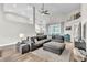 Bright living room with vaulted ceilings, recessed lighting, and seamless flow to the outdoors at 1610 River Birch Ave, Oviedo, FL 32765