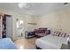 Bedroom featuring neutral walls, tile flooring, and a dark wood crib at 1828 Matterhorn Dr, Orlando, FL 32818