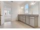 Bathroom with granite vanity and access to additional room at 18964 Rawson St, Orlando, FL 32827