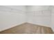 Walk-in closet with carpeted floor and wire shelving at 18964 Rawson St, Orlando, FL 32827