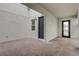 Private outdoor courtyard with brick flooring and an inviting entrance to the modern home at 18964 Rawson St, Orlando, FL 32827