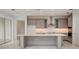 Modern kitchen featuring an island, stainless steel appliances, and ample countertop space at 18964 Rawson St, Orlando, FL 32827