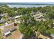 An aerial view shows the neighborhood and its proximity to the lake at 2014 10Th Nw St, Winter Haven, FL 33881